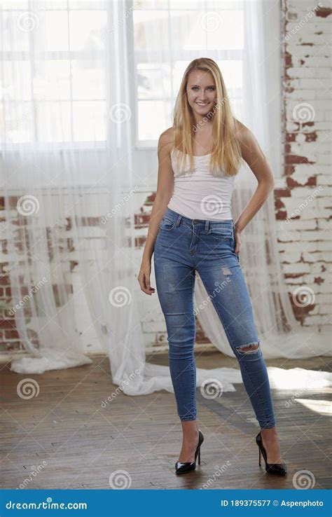 blondes in tight jeans|Beautiful young blonde in jeans Stock Photos and Images.